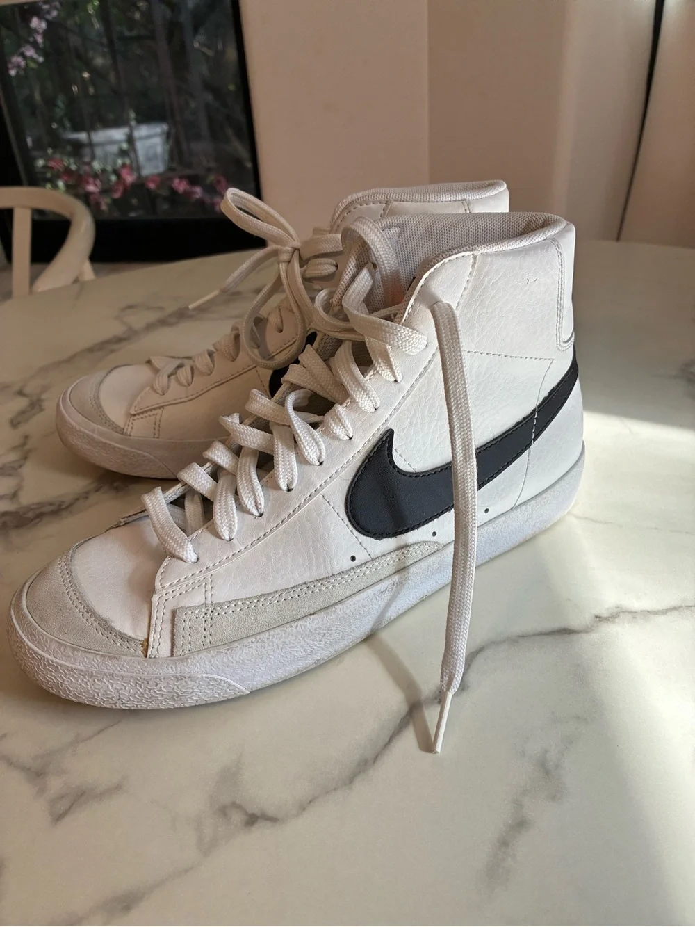 Nike White High-Top Sneakers with Black Swoosh Accent
